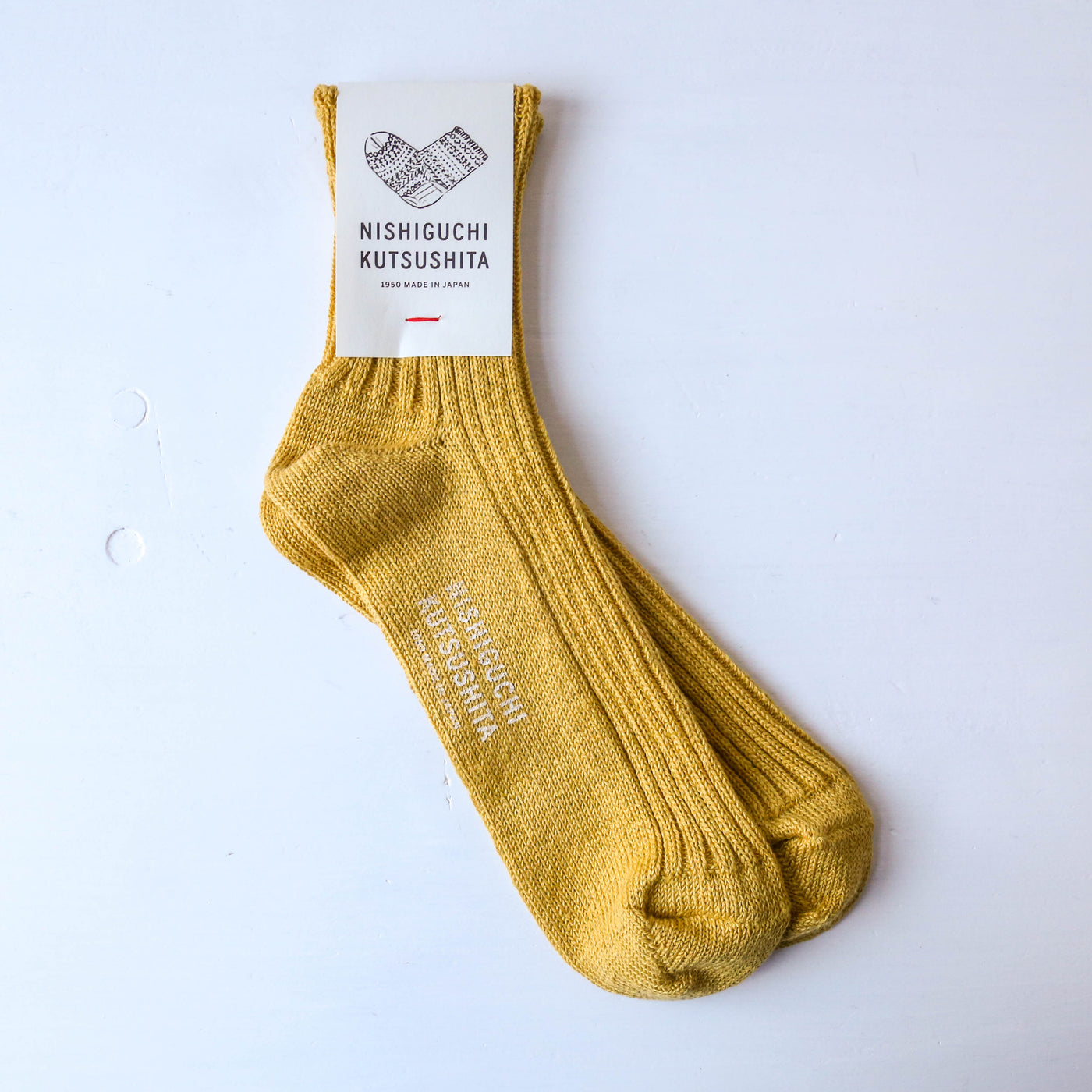 Linen Ribbed Socks by Nishiguchi Kutsushita